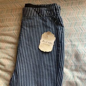black/navy and white vertical striped flare pants